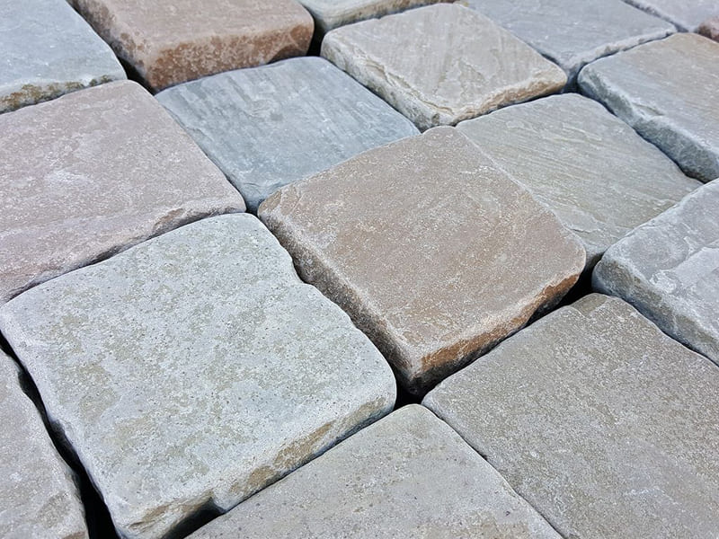 raj-blend-green-indian-sandstone-square-cobbles-cubes-setts-close-up-natural-surface-finish-hand-tumbled-stones-landscaping