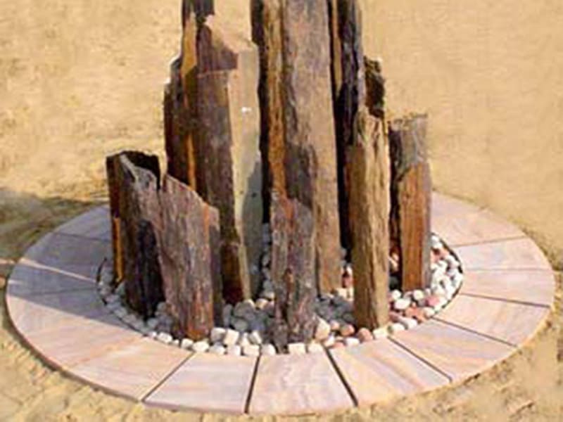 monolith-slate-statue-circle-articles
