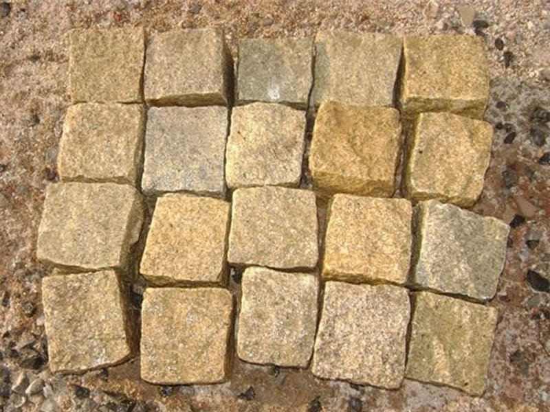 rustic-yellow-golden-granite-cobbles-stone-setts-green-garden-field-yard-landscaping-architectural-constructional-project-products