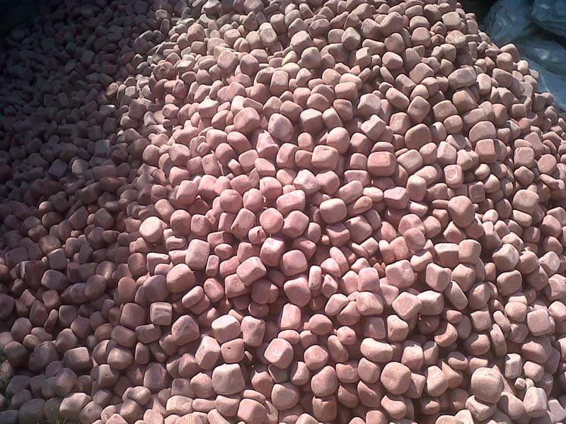 red-smooth-texture-rock-sandstone-desert-tumbled-natural-pebbles-building-material