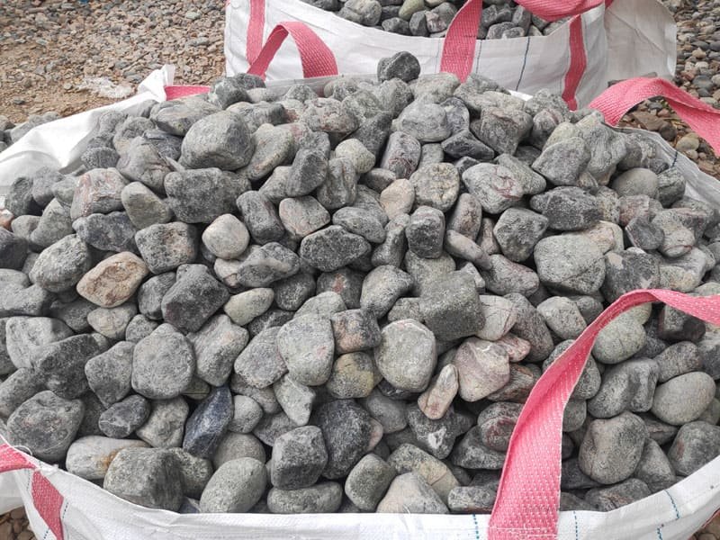 silver-grey-colour-tumbled-marble-pebbles-jumbo-bags-garden-stones-packing-supplier-exporter-india