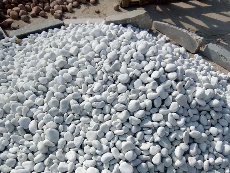 white-tumbled-marble-stone-pebbles-unpolished-outdoor-garden-landscaping-stock-photo-images